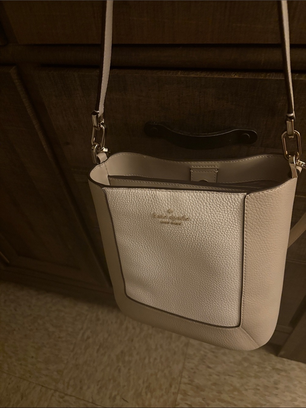 kate spade Cream Pebbled Leather Crossbody with Gold Logo